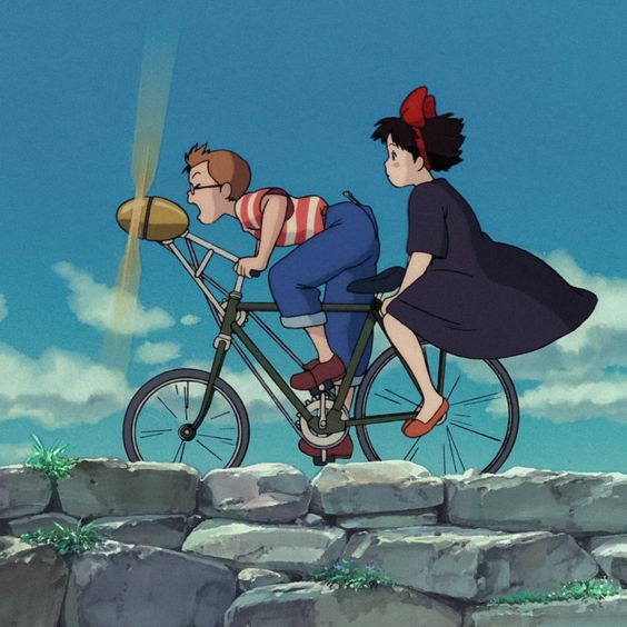 トンボとキキが空飛ぶ自転車に乗る画像
